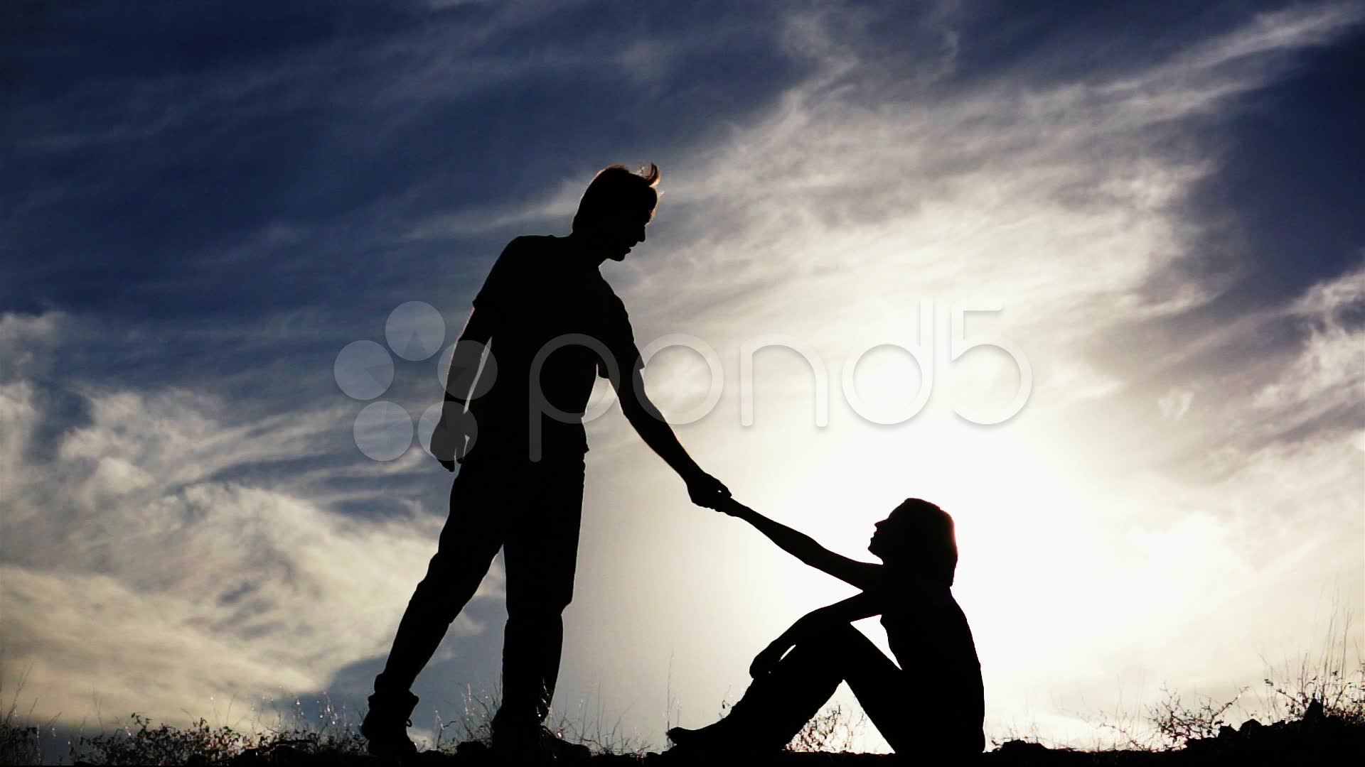 silhouette-helping-hand-footage-021058452_prevstill